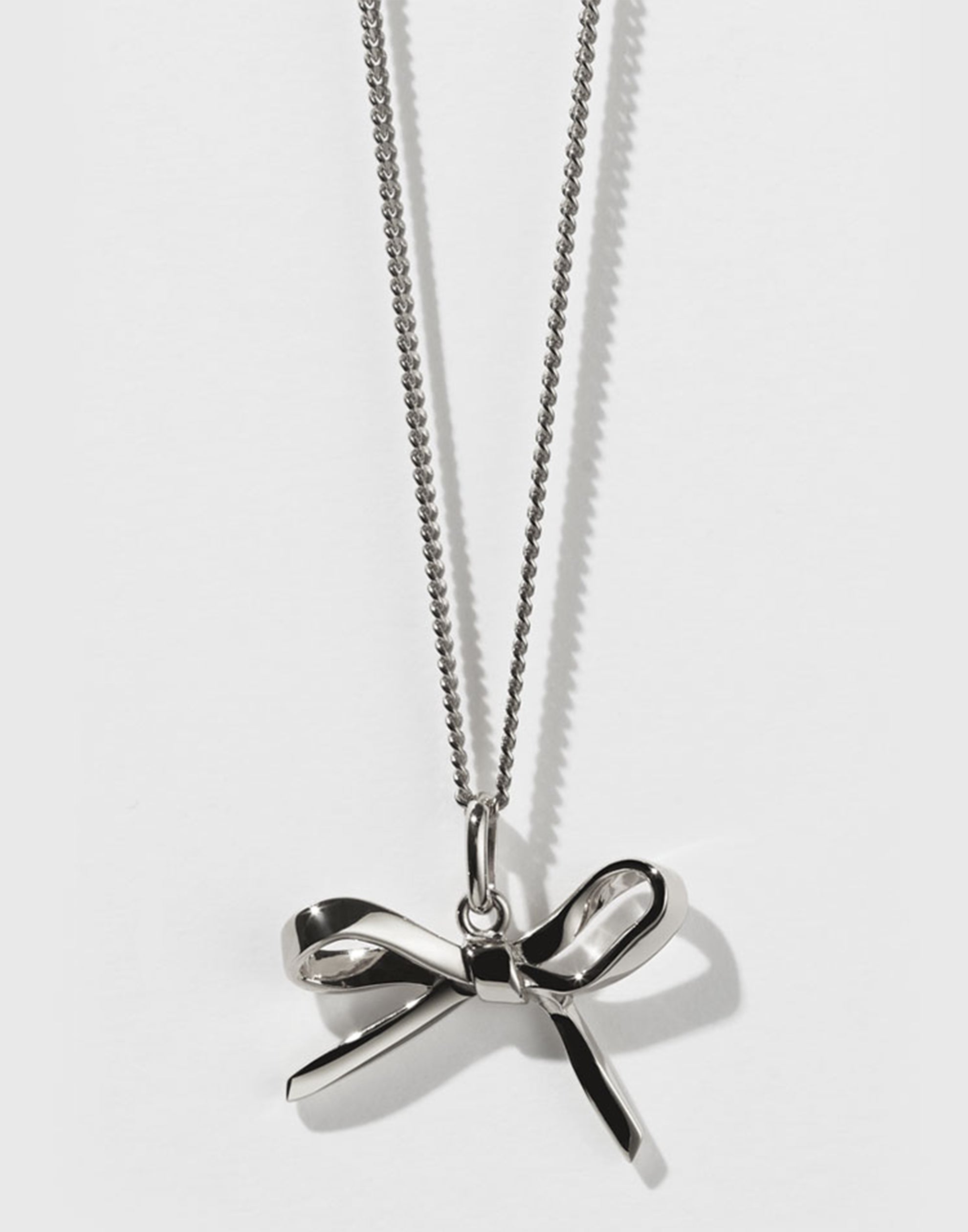 meadowlark-sterling-silver-bow-charm-necklace.jpeg