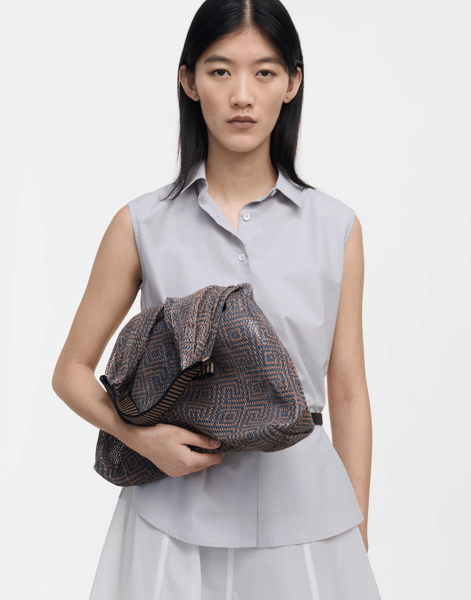 Rosso Small Triangle Udaipur Bag