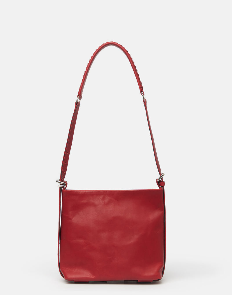 cornelian-taurus-small-red-leather-parallel-bag.jpeg