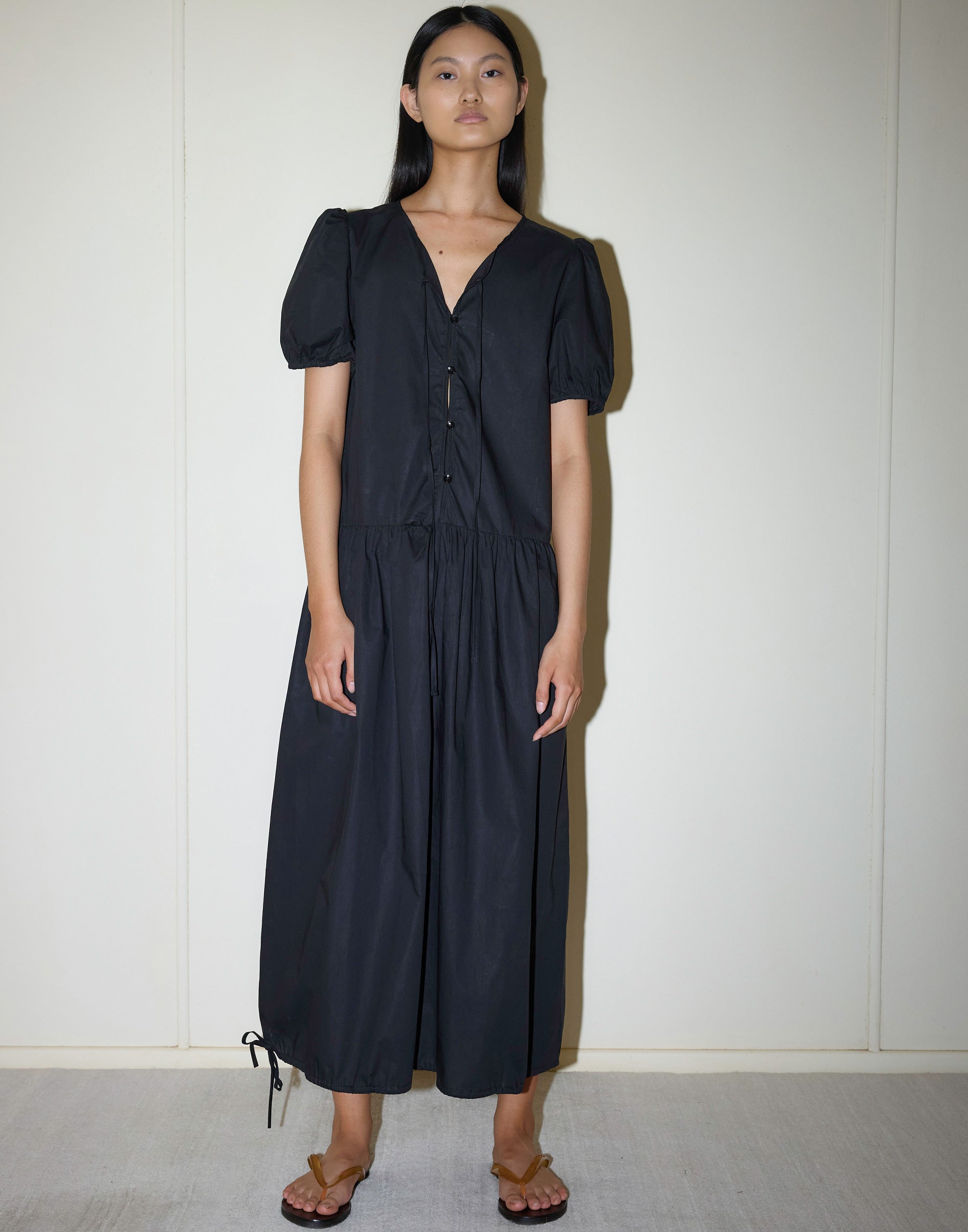 deiji-studios-black-cotton-draw-hem-dress.jpeg