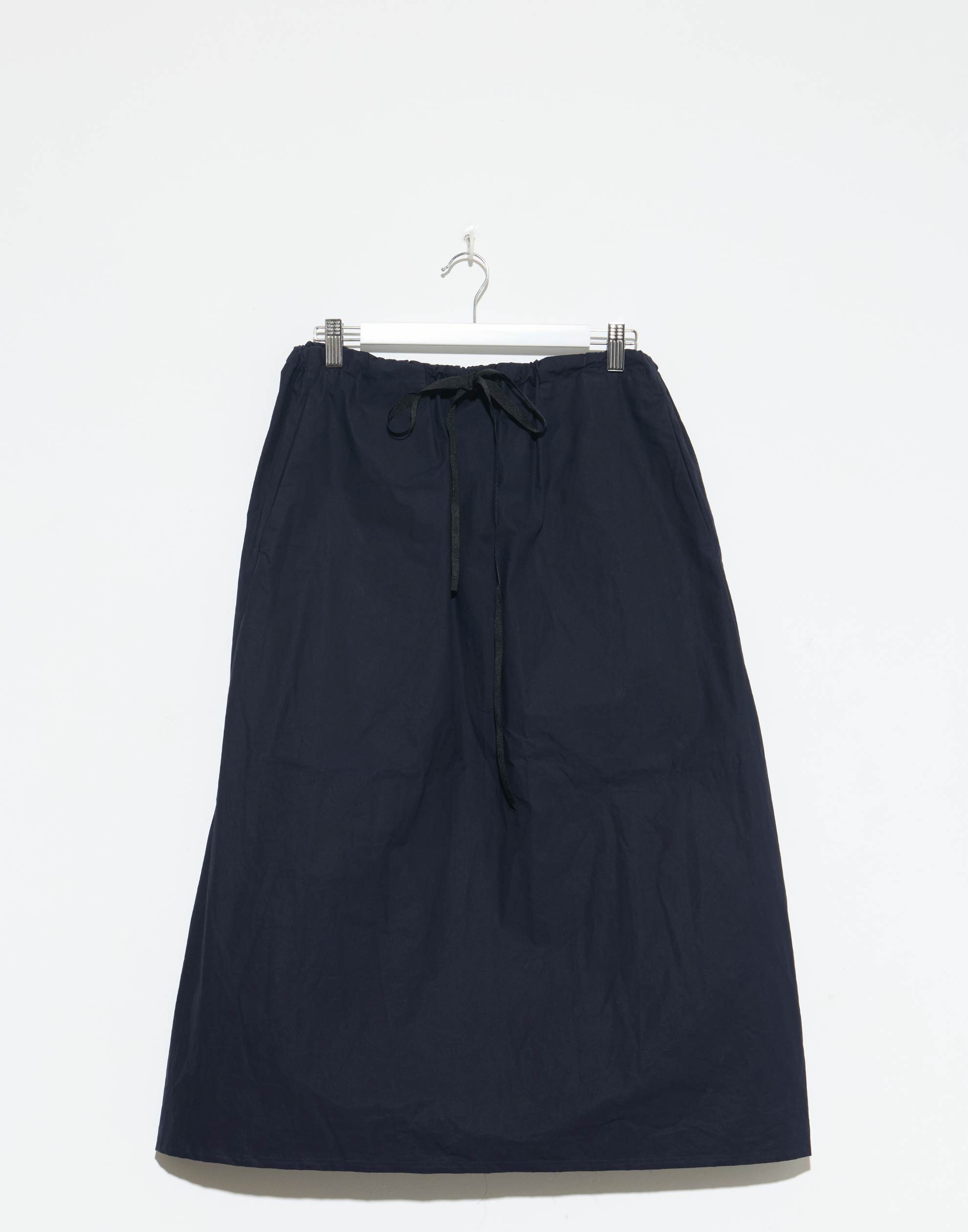 scha-dark-indigo-waxed-cotton-skirt.jpeg